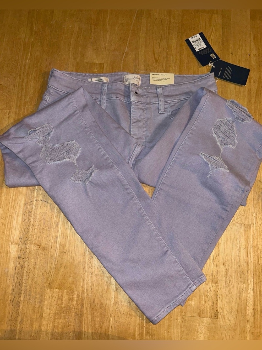 Woman’s teens size 10 or 30in waist high rise skinny ripped jeans lilac, violet,